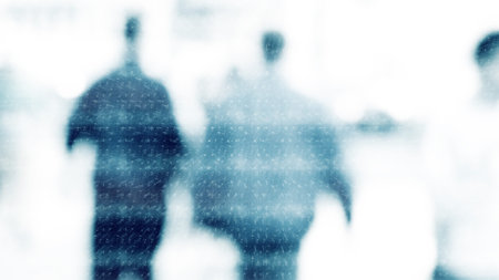 Winter city commuters with snow. Blurred image of people walking on the street. back home after...