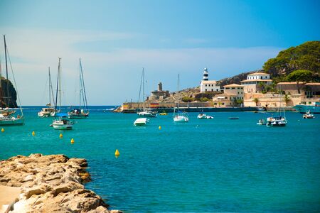 Puerto de Soller, Port of Mallorca island in balearic islands, Spain. Beautiful picture of boats in clear blue water of bright summer day.の写真素材