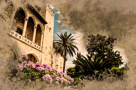 Almudaina palace with blooming pink flowers against blue sky and clouds, Palma de Mallorca, Balearic islands, Spain. Modern painting, background illustration.の写真素材