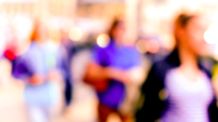City commuters. Blurred image of workers going back home after work. Unrecognizable faces, bleached effect.の写真素材