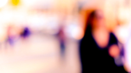 City commuters. Blurred image of workers going back home after work. Unrecognizable faces, bleached effect.の写真素材