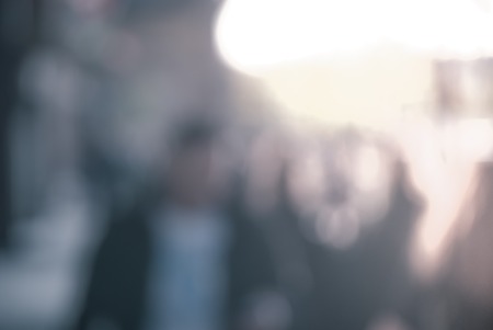 City commuters at sunset. Blurred background image for business, modile apps, and other uses.の写真素材