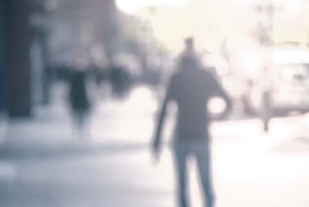 City commuters at sunset. Blurred background image for business, modile apps, and other uses.の写真素材