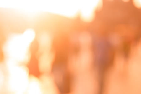 City commuters. High key blurred image of workers going back home after work. Unrecognizable faces, bleached effect.の写真素材