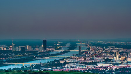 Beautiful view of skyline of Vienna and Danube River with green trees of Doebling district, Austria. Travel photo of the landmark.の写真素材