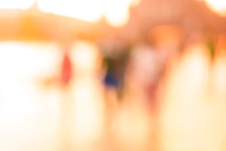 City commuters. High key blurred image of workers going back home after work. Unrecognizable faces, bleached effect.の写真素材