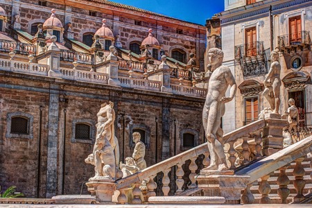 Beautiful sculpture of the famous fountain of shame on baroque Piazza Pretoria, Palermo, Sicily, Italyの写真素材