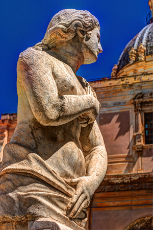 Beautiful sculpture of the famous fountain of shame on baroque Piazza Pretoria, Palermo, Sicily, Italyの写真素材