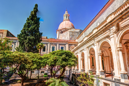 Cloister of the Benedictine Monastery of San Nicolo l'Arena in Catania, Sicily, Italy, - a jewel of the late Sicilian Baroque style.の写真素材