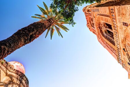 Belltower of church Martorana with palm trees, Palermo. Sicily. Beautiful architecture of the historical district.の写真素材