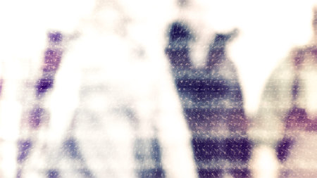 Winter city commuters with snow. Blurred image of people walking on the street. back home after work. Defocused figures of people with snowing effect and frost.の写真素材