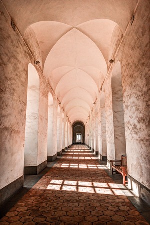 Image of the cloister arches inside a monastery. Architectural background.の写真素材