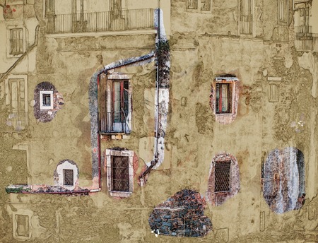 red vintage old brick wall with windows and green ivyの写真素材