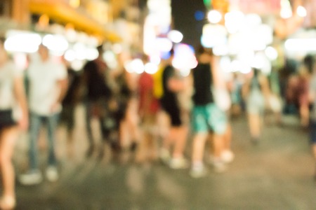 Blurred image of busy night life in the city.の写真素材