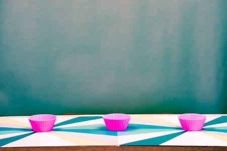 Party background with cupcakes and confettiの写真素材