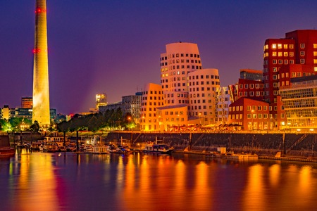 Colorful night scene of Rhein river at night in Dusseldorf.の写真素材