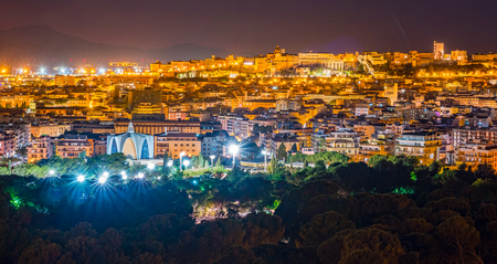 Cagliari at night, capital of the region of Sardinia, Italy. Beautiful skyline image of the big city on the island.の写真素材
