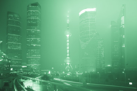 Shanghai Bund Skyline at night. Skyscrapers of Shanghai in night illumination.