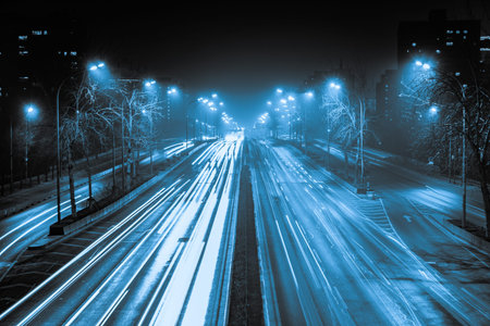 Modern city traffic at night, China, Beijing. Transportation background.
