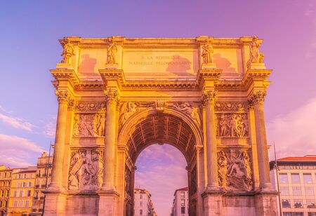 Porte Royale - triumphal arch in Marseille, France. Constructed in 1784 - 1839. Inscription on arch in French: To the Republic . Grateful Marseille.の写真素材