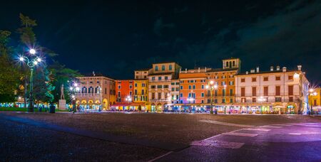 City center at night, with ancient famous buildings of the city of Verona, Italy. Gorgeous view of the famous italian city.の写真素材