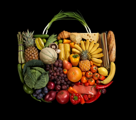 Assorted fruits handbag - studio photography of designer handbag made from different fruits and vegetables - on black backgroundの写真素材