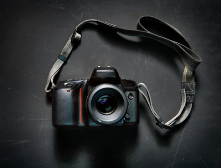 Professional camera on black backgroundの写真素材