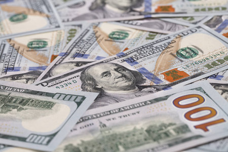 Background with money - studio photography of American moneys of hundred dollar