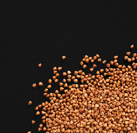 Scattered view of dry raw peeled buckwheatの写真素材