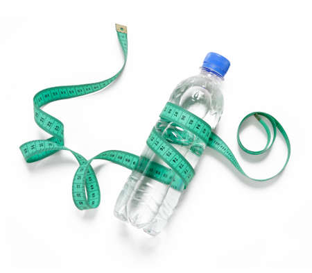 Bottled water for healthy life over a white backgroundの写真素材