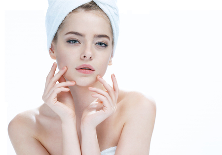 Charming young fashion model photo composition of blonde girl in towel - isolated on white backgroundの写真素材