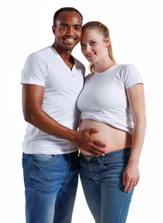 Young attractive couple: pregnant mother and happy fatherの写真素材
