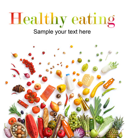 Healthy eating background, studio photography of different fruits and vegetables on white backdropの写真素材