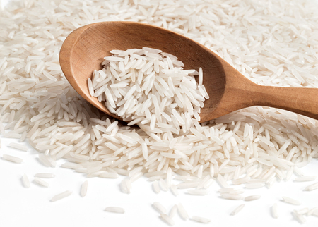 White  rice in wooden spoon.  Close upの写真素材