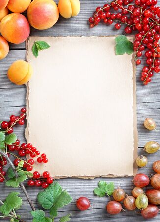 Healthy eating concept. Photography of different berries on old wooden table. Copy space for your text. Top view, high resolution product.の写真素材