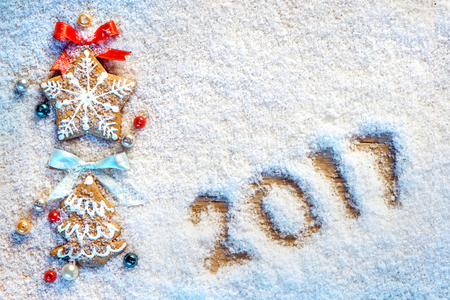 Christmas cookies on snowy background with inscription 2017. Merry Christmas and Happy New Year !! Top view.の写真素材