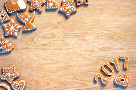 Traditional Christmas cookies on wooden table. Top view. Christmas baking conceptの写真素材
