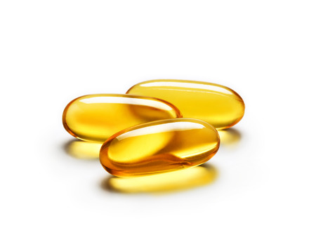 Omega 3 capsule isolated on white background. Close up, high resolution product.の写真素材