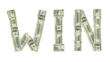 Word "WIN" made of dollars. Photography of money made word - on white background. Top view. High resolution productの写真素材