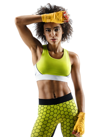 Photo of young african sport girl isolated on white background.の写真素材