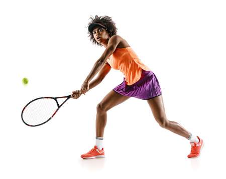 Young tennis girl in silhouette isolated on white background. Dynamic movementの写真素材