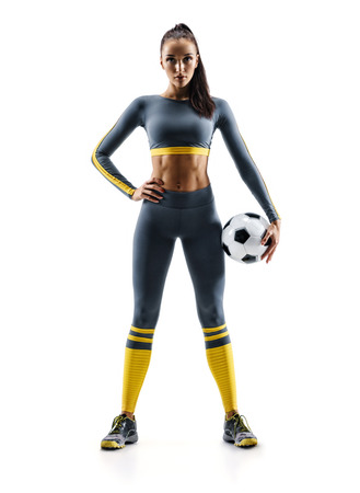 Ready to play. Soccer player woman standing in silhouette isolated on white background. Sport and healthy lifestyleの写真素材