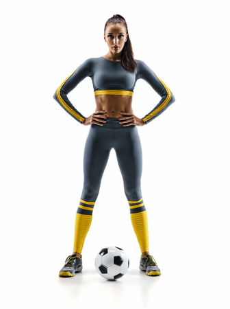 Ready to play. Soccer player woman standing in silhouette isolated on white background. Sport and healthy lifestyleの写真素材