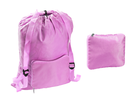 Neon purple backpack and purse isolated on white backgroundの写真素材