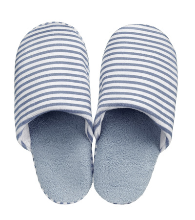 Grey striped slippers isolated on white background. Close up, high resolutionの写真素材