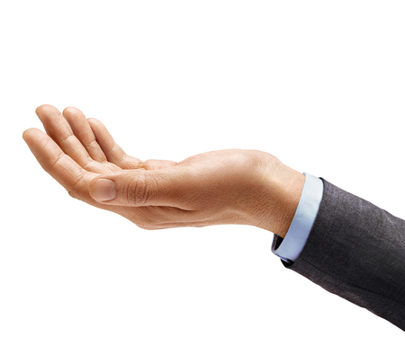 Man's hand in suit begs to something isolated on white background. Palm up, close up. High resolution productの写真素材