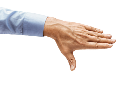 Man's hand in a shirt closes something isolated on white background. Close up. High resolution productの写真素材