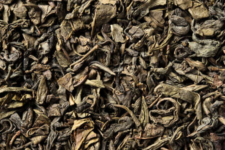 Green tea leaves on white background. top view. close up. high resolutionの写真素材