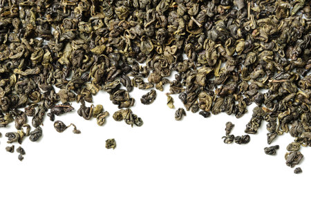 Ganpauder, green tea rolled into small round pellet on white background. top view. close up. high resolutionの写真素材