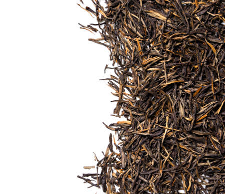 Dian Hong Jin Zhen. Red tea, golden needles on white background. top view. close up. high resolutionの写真素材